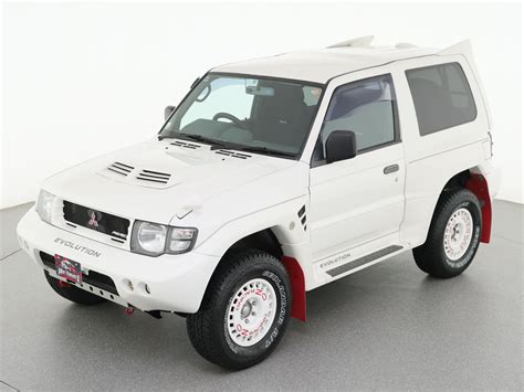 latest collector suv   dakar champ mitsubishi pajero evolution