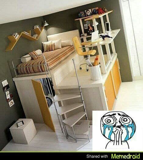 A Room With Stairs Leading Up To The Top Floor And Below It Is A Loft Bed