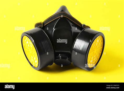 One Respirator Mask On Yellow Background Closeup Stock Photo Alamy