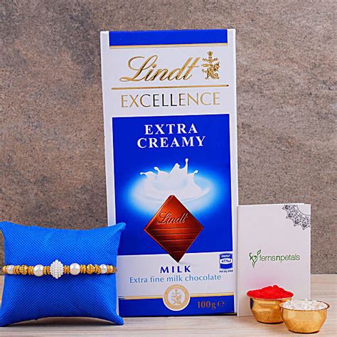 Divine Golden Pearl Thread Rakhi And Lindt Chocolate Singapore Gift