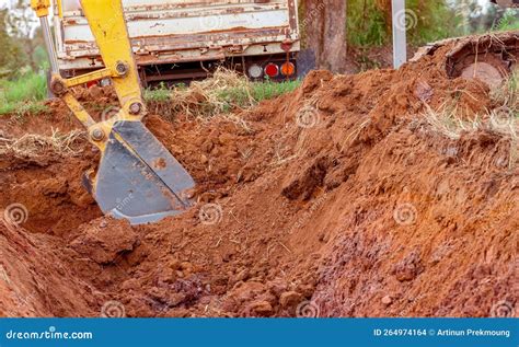 Excavator Bucket Digging Soil For Loading To Truck Earthwork Dirt