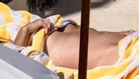 Charlize Theron Nude Sunbathing Photos
