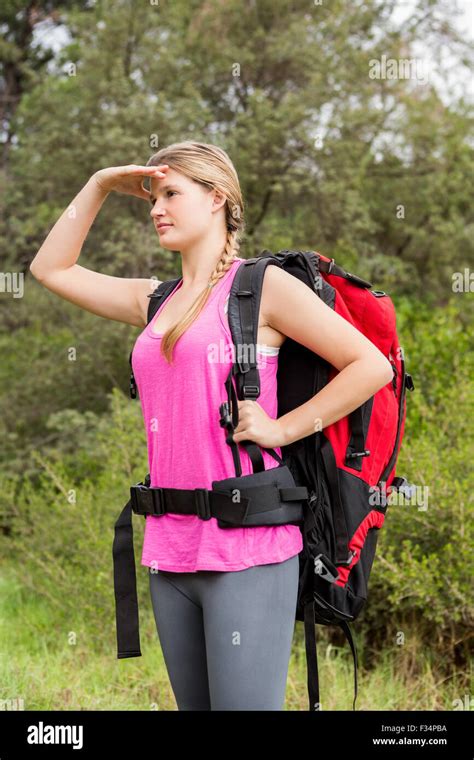 Blonde Hiker Looking For Path Stock Photo Alamy
