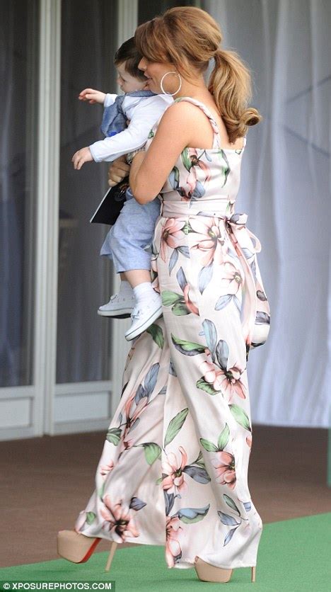 Coleen Rooney Gives Her Feet A Break In Customised Converse Daily