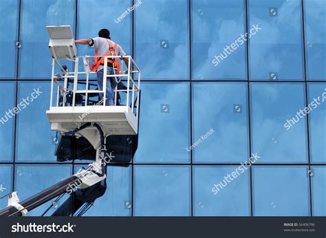 Window Cleaner On A Lift Over 520 Royalty Free Licensable Stock Photos