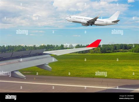 View From The Window Of The Aircraft After Landing On The Runway And A