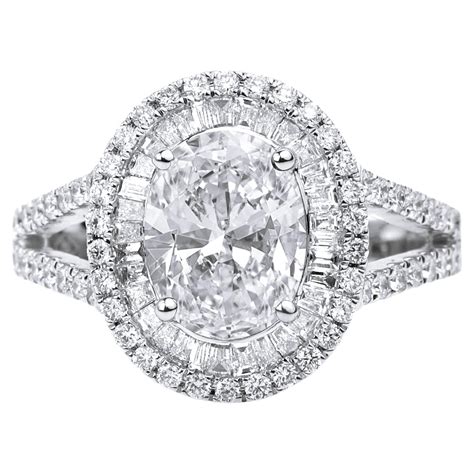 GIA Report Certified 1 Carat E VS Oval Cut Diamond Double Halo