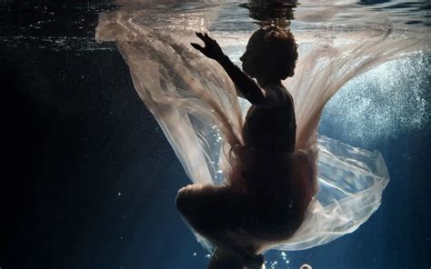 Surreal Poses For Underwater Nude Photography In