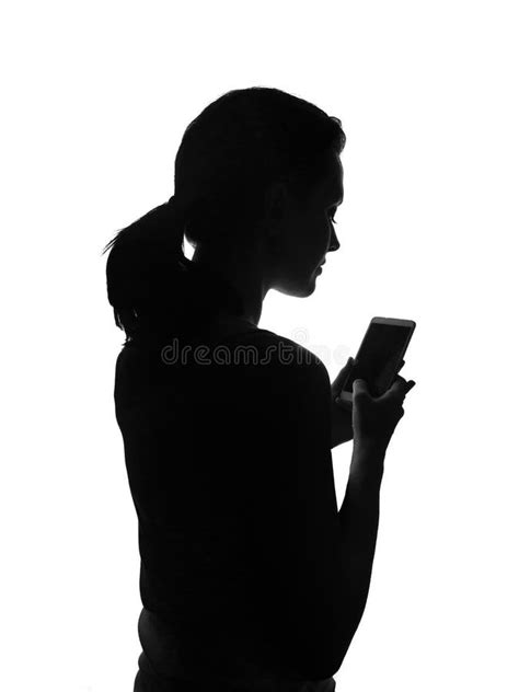 Silhouette Woman With A Phone On A White Background The Girl Is