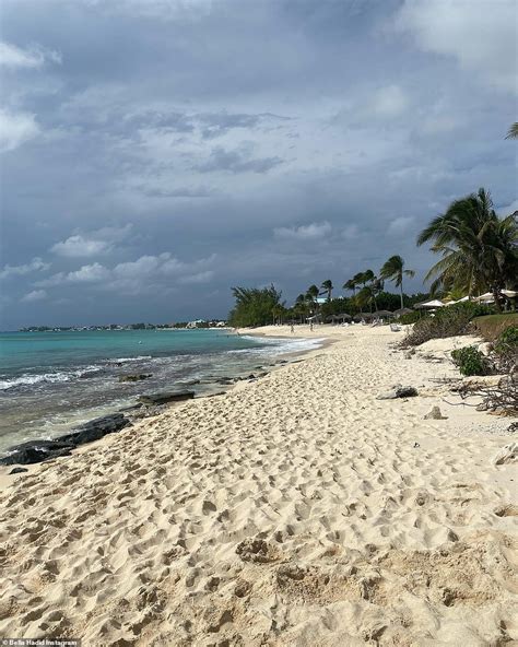 Bella Hadid Puts Her Toned Body On Display In A Skimpy Pink And White Bikini Daily Mail Online