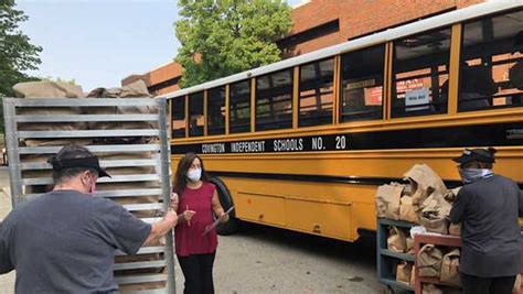 Covington School Buses Deliver Meals Right To Students Doorstep