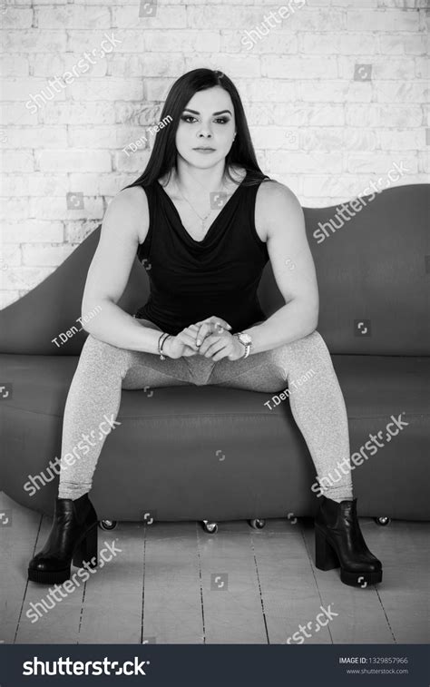 Sexy Mature Fit Athletic Woman Demonstrates Stock Photo