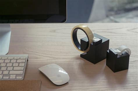 A Compact One Handed Tape Dispenser