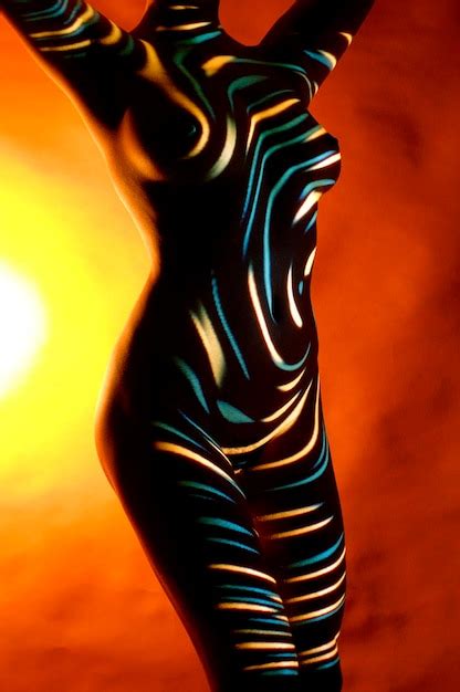 Premium Photo Silhouette Naked Woman Standing Against Colored Background