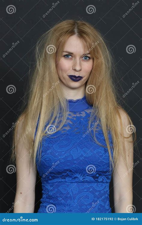 Beautiful Blonde European Girl With Blue Eyes Posing In Studio On Isolated Background Style