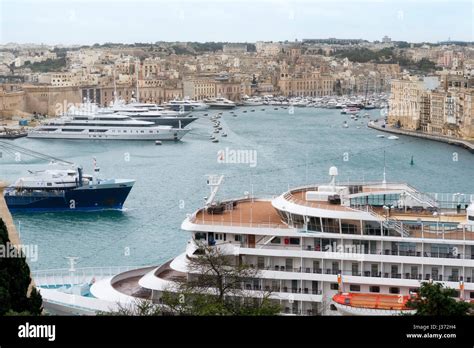 Cruise ship and yachts docked at the port of Malta Stock Photo - Alamy