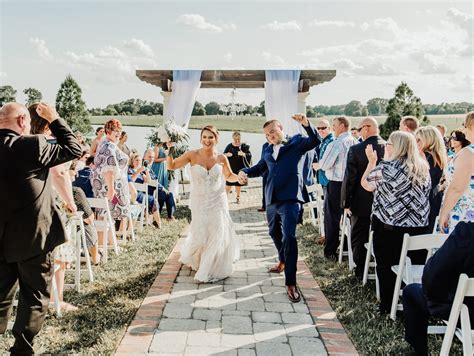 Bride And Groom Dancing Down The Aisle Champagne Manor