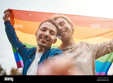 Romantic Gay Couple Hugging Kissing And Holding Hands Outdoors Two Handsome Men Holding Lgbt