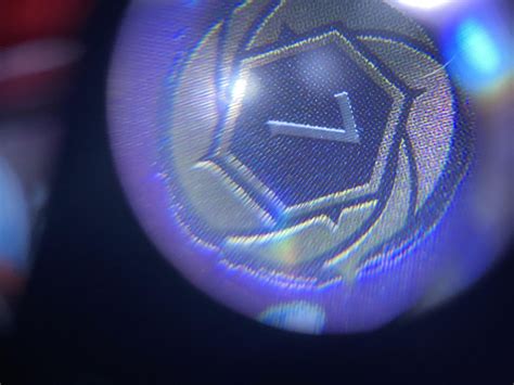 Is this card authentic or fake?? : r/Lorcana