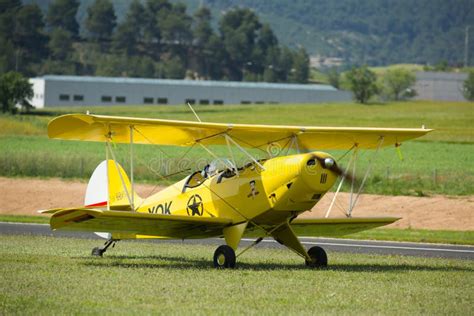 An Old Yellow Biplane Airplane From The Early Th Century Editorial