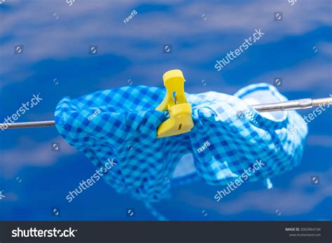 Wet Swimsuit Hanging On Clothesline Bikini Stock Photo 2003964104