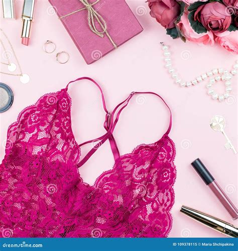 Woman Fashion Accessories Make Up Products And Red Lingerie On Pastel Background Stock Image