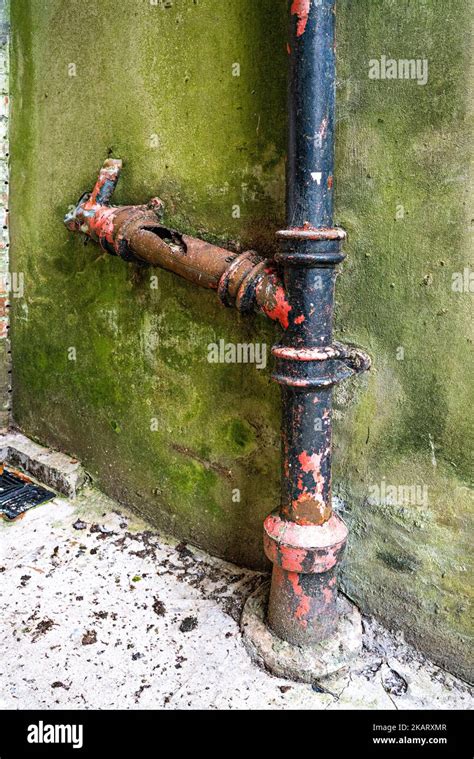 Broken Cast Iron Domestic Exterior Drainpipes Stock Photo Alamy