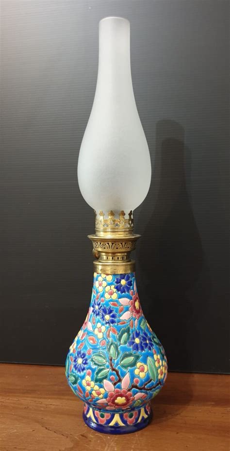 Lampe à pétrole en émaux de Longwy Caryantiq