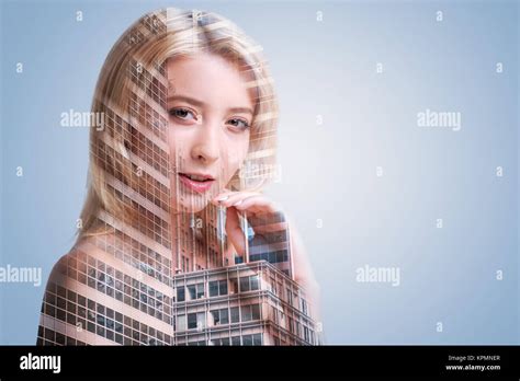 Joyful Blonde Girl Looking Into Camera Invitingly Stock Photo Alamy