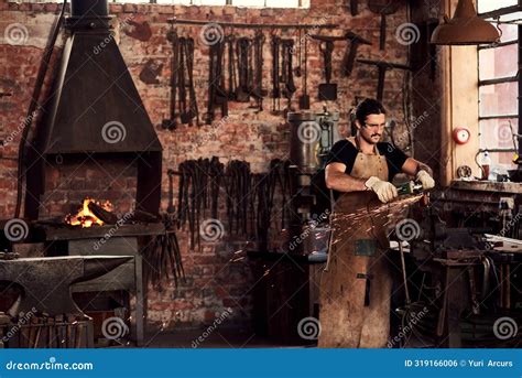 Blacksmith Metal Worker Or Man In Factory And Sparks Manual Labor For Safety On Hot Steel With