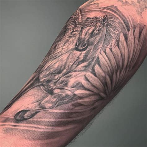 Black And Grey Pegasus Tattoo On The Inner Forearm