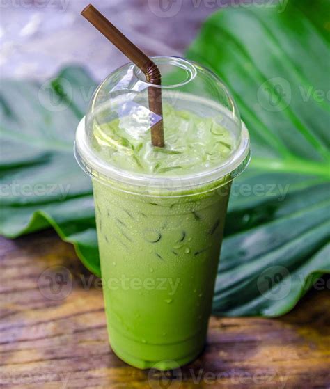 iced matcha latte green tea  milk   plastic glass  ice