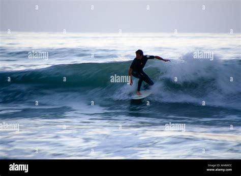 California Beach Sunset Surfers Stock Photo - Alamy