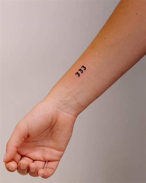 Tattoo Of The Number 333 Located On The Wrist