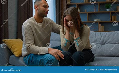 Guilty African American Man Apologizing To Crying Woman Caring Husband