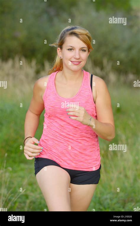 Young Woman Running Stock Photo Alamy