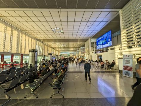 Pasay, Metro Manila, Philippines Passengers Wait at a Boarding Gate at ...