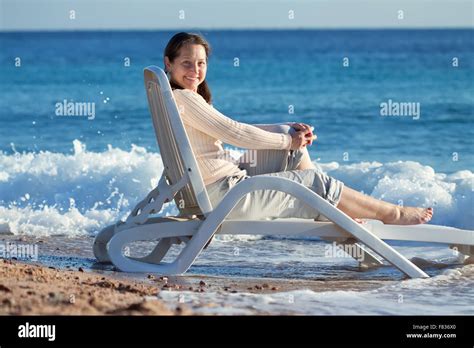 Happy Mature Woman Enjoying On Sea Beach Stock Photo Alamy