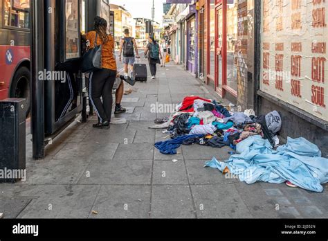 Old Dirty Clothes Left Discarded On A High Street In Camden North