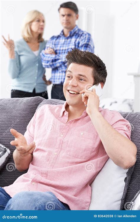 Unhappy Mature Parents With Adult Son Living At Home Royalty Free Stock Image CartoonDealer