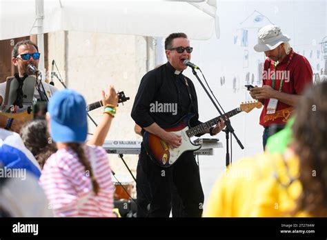 A Band Including A Catholic Priest Giving A Concert During World