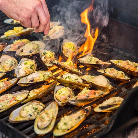 Grilled Half Shell Nz Greenshell™ Mussels With Lemon Parmesan And Garlic