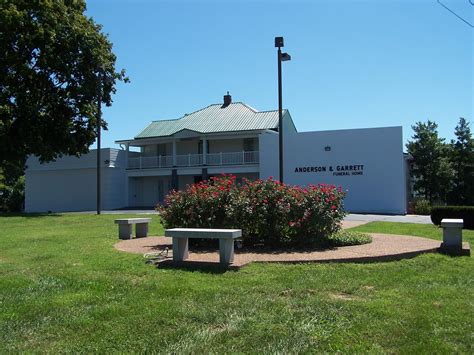The director explains the history of gordon garrett funeral home 6