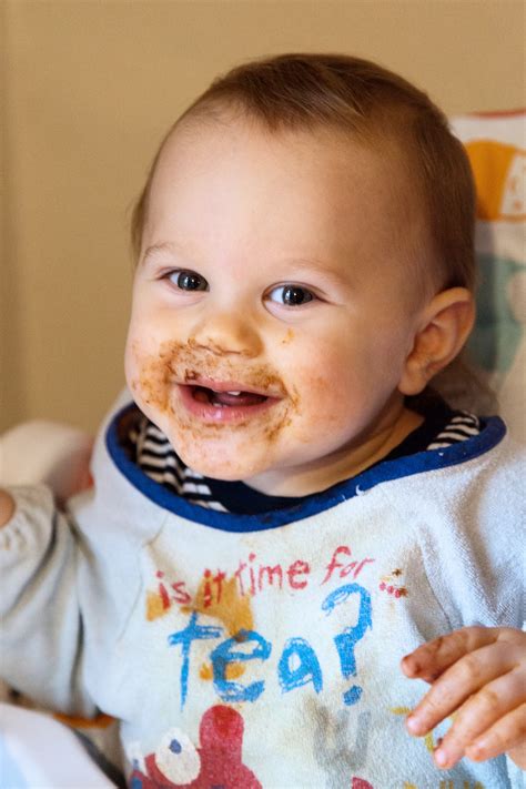 baby  eating chocolate  stock photo public domain pictures