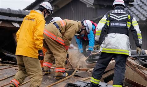 japanese rescue teams race  locate survivors   death toll
