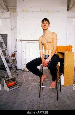 A Life Drawing Class Painting A Male Nude Model Stock Photo Alamy