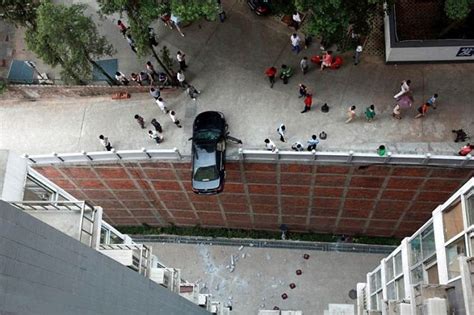 Talk About A High Sex Drive Amorous Couple Left Swinging Over Rooftop Car Park After Kicking