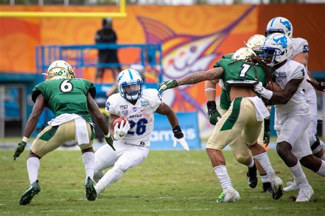 Ub Football Tops Charlotte In Bahamas For First Bowl Win In Program