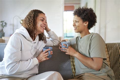 Happy Lesbian Couple Drinking Coffee Stock Image F Science Photo Library