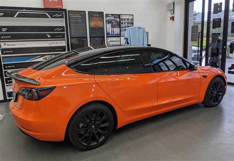 Tesla Model Wrapped In Gloss Orange With Pillar Delete Tesla Model My